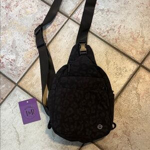 New Iris and Rainbow Clutch Sling